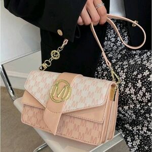 Chic Pink and Gold Crossbody Bag with Textured Finish